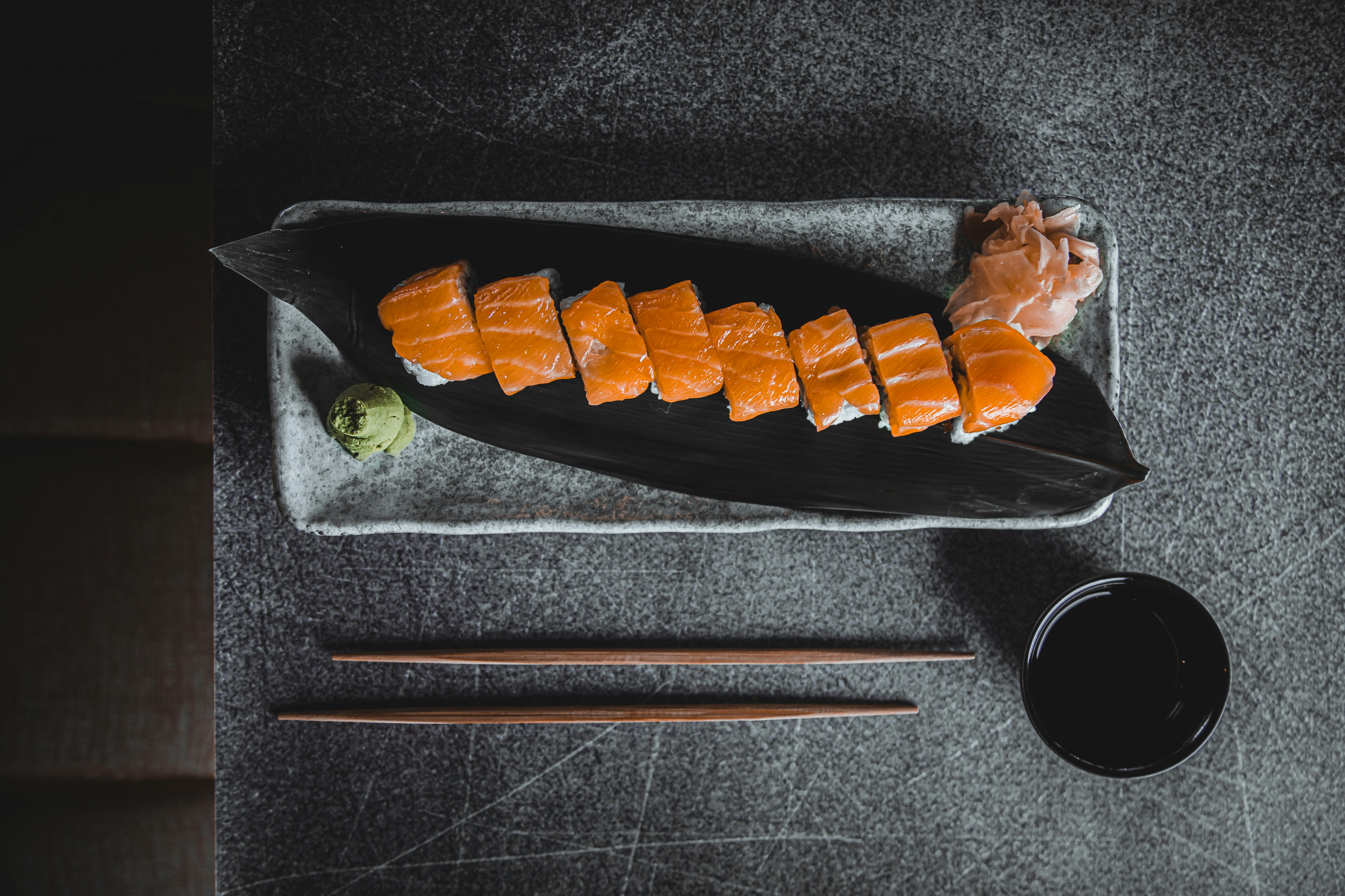 sushi on black plastic tray